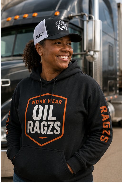 Woman wearing Oil Ragzs hoodie in front of a semi truck